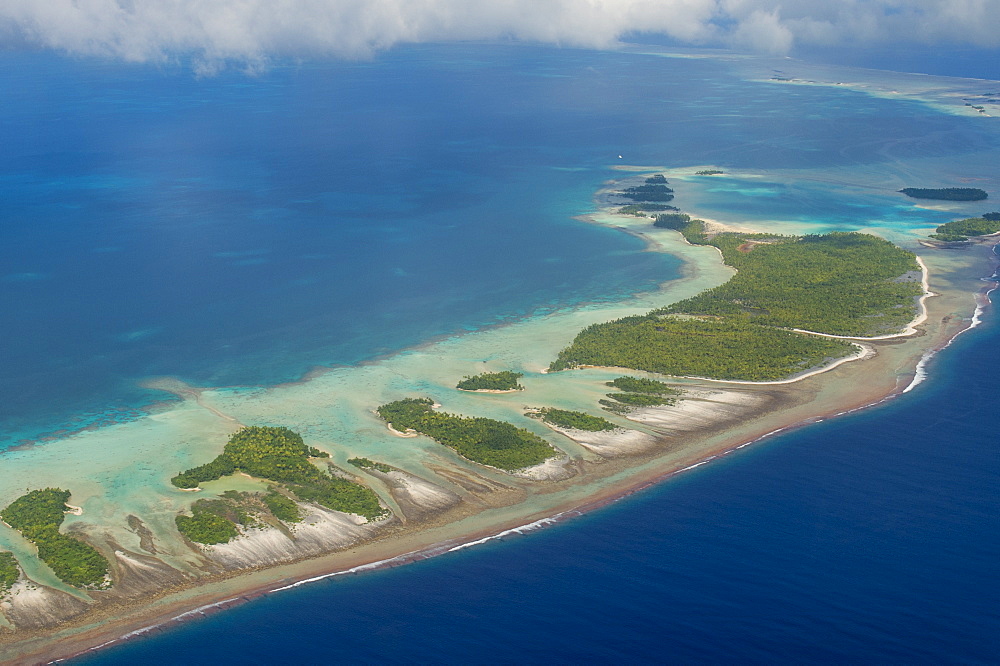 Aerial of the blue lagoon in Rangiroa, Tuamotus, French Polynesia, Pacific