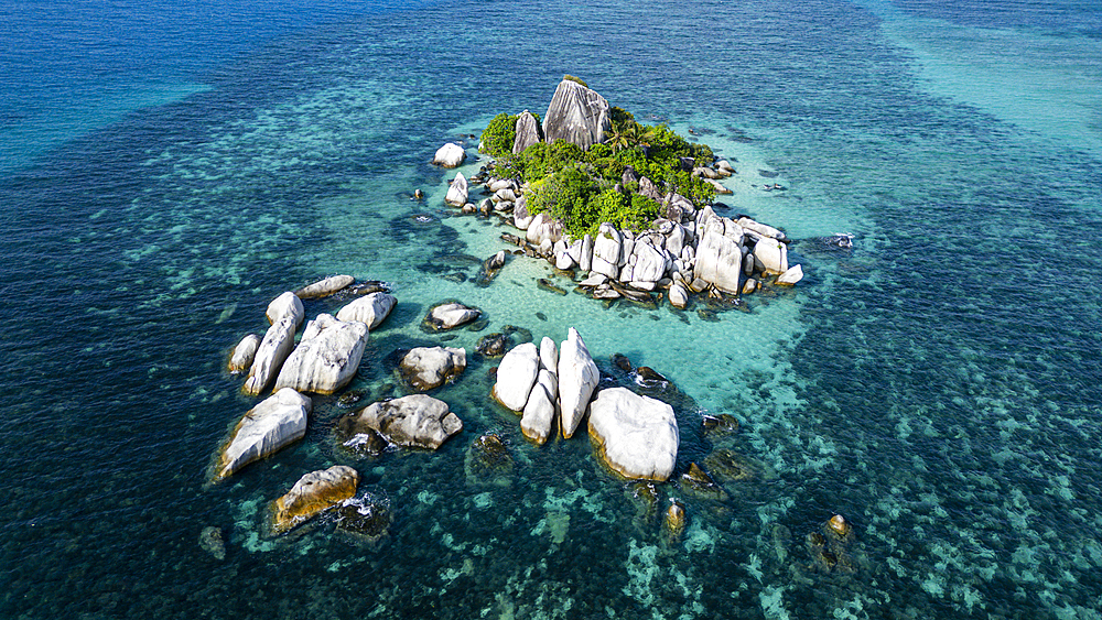 Aerial of rocks off Lengkuas Island, Belitung island off the coast of Sumatra, Indonesia, Southeast Asia, Asia