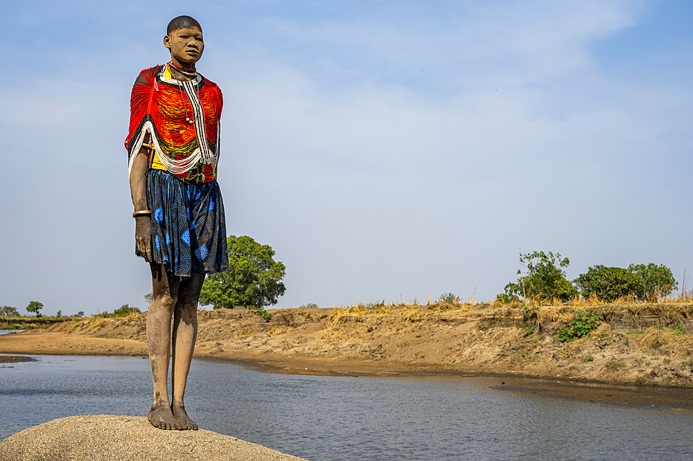 Pretty Mundari girl in a traditional dress, Mundari tribe, South Sudan, Africa