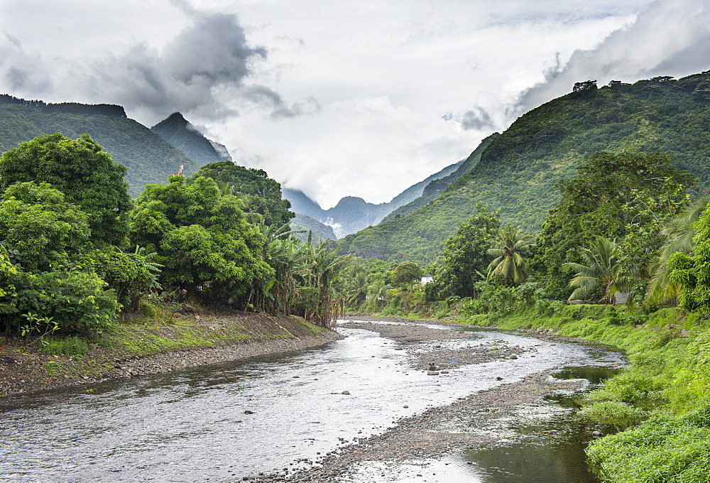 Paea River with dramatic mountains in the background, Tahiti, Society Islands, French Polynesia, Pacific