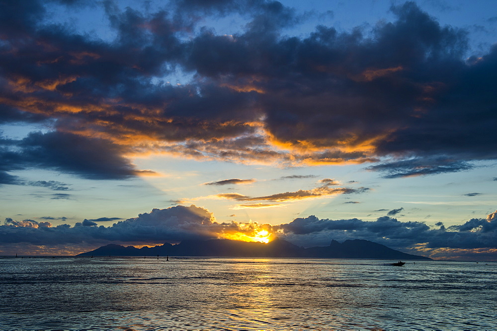 Dramatic sunset over Moorea, Papeete, Tahiti, Society Islands, French Polynesia, Pacific