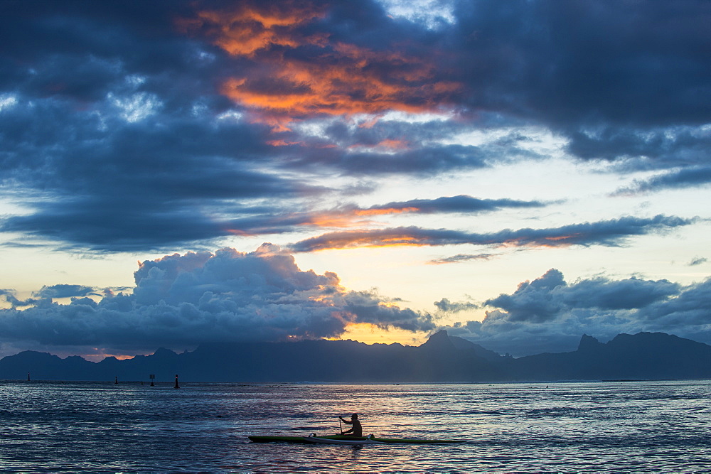 Dramatic sunset over Moorea, Papeete, Tahiti, Society Islands, French Polynesia, Pacific