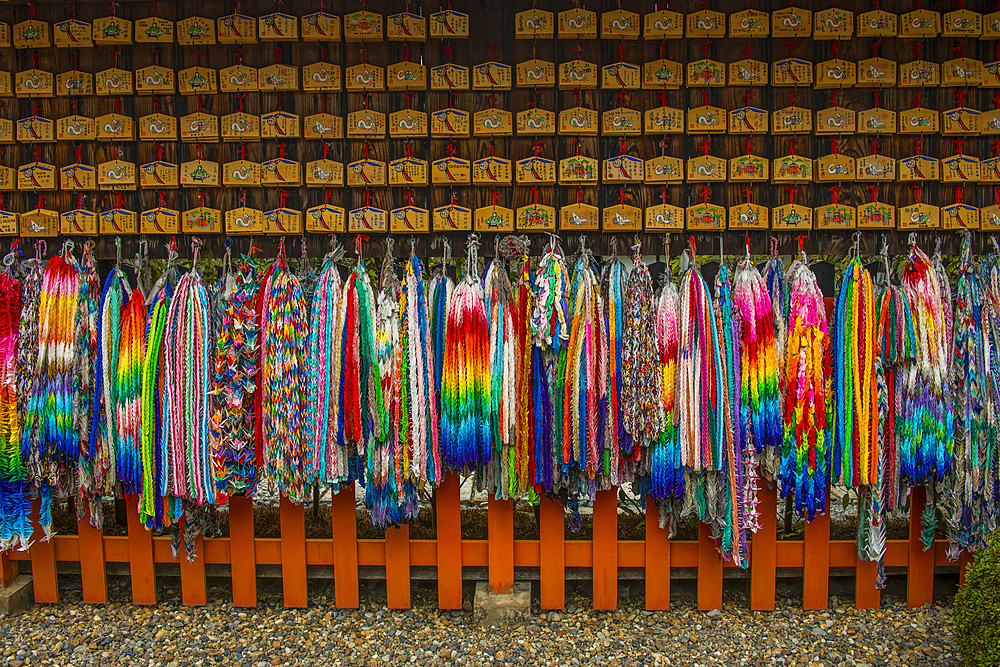 Colourful prayer ribbons at the Endless Red Gates of Kyoto's Fushimi Inari, Kyoto, Honshu, Japan, Asia