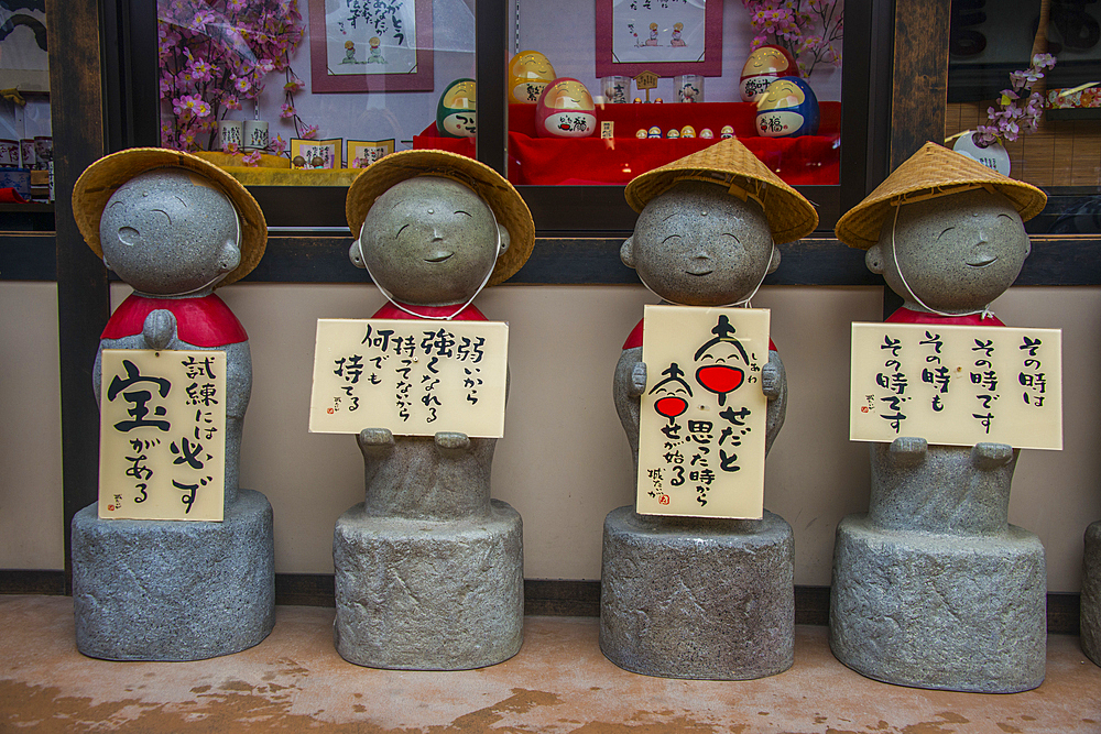 Stone statues, Miyajima, Japan, Asia