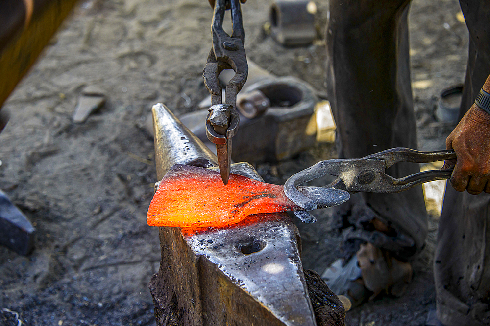 Blacksmith forging knives, Keren, Eritrea, Africa