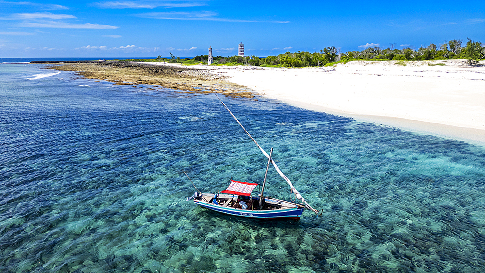 Aerial of a traditional Dhow on a white sand beach, Goa island near the Island of Mozambique, Mozambique, Africa