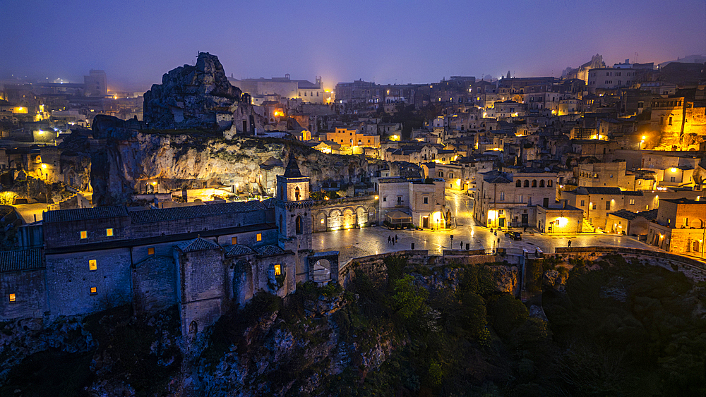 Aerial of Sassi di Matera at night, UNESCO World Heritage Site, Basilicata, Italy, Europe