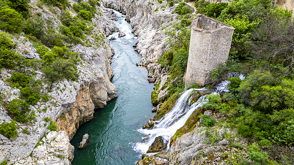 Aerial of an old watchtower in the Herault gorge, UNESCO World Heritage Site, Causses and Cevennes, Herault, Occitanie, France, Europe