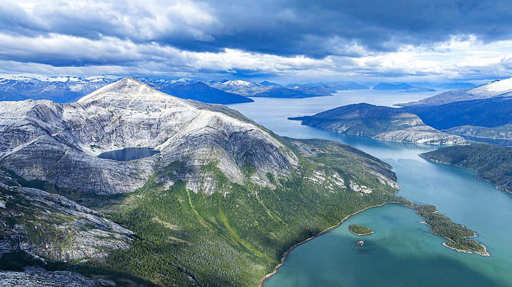 Deep blue lake in the mountains above Pia glacier, Tierra del Fuego, Chile, South America