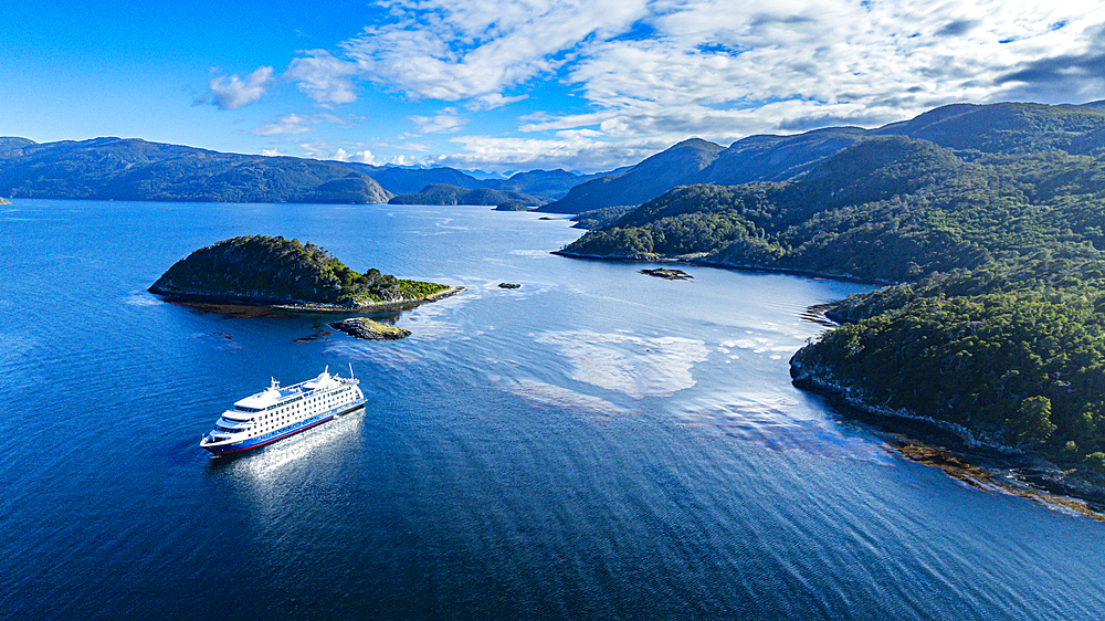 Cruise ship anchoring in Wulaia Bay, Tierra del Fuego, Chile, South America