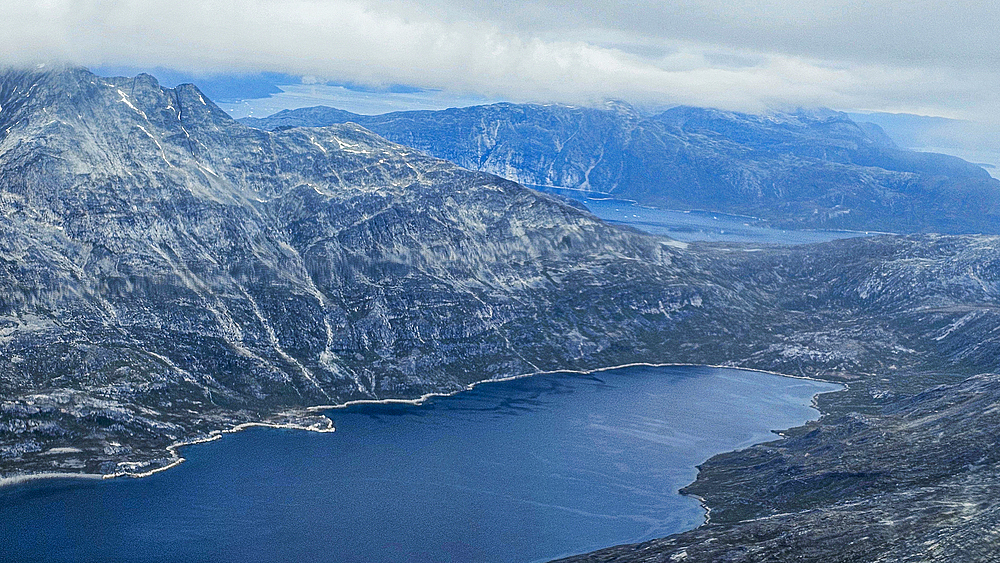 Aerial of the mountainous coastline around Kulusuk, Greenland, Polar Regions