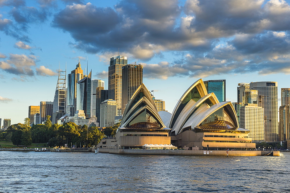 The Sydney Opera House, UNESCO World Heritage Site, and skyline of Sydney at sunset, New South Wales, Australia, Pacific