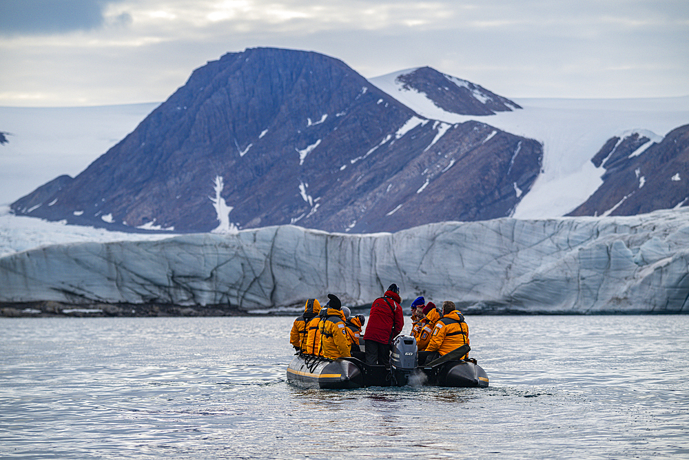 Tourists in zodiac, Belcher glacier, Devon island, Nunavut, Canadian Arctic, Canada, North America