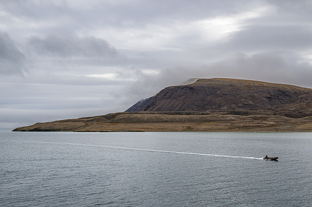 Zodiac in the Arctic desert in Dunes harbour, Devon island, Nunavut, Canadian Arctic, Canada, North America