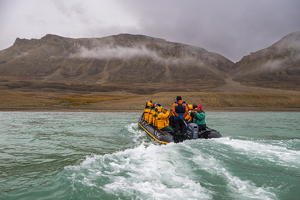 Zodiac in the Arctic desert in Dunes harbour, Devon island, Nunavut, Canadian Arctic, Canada, North America