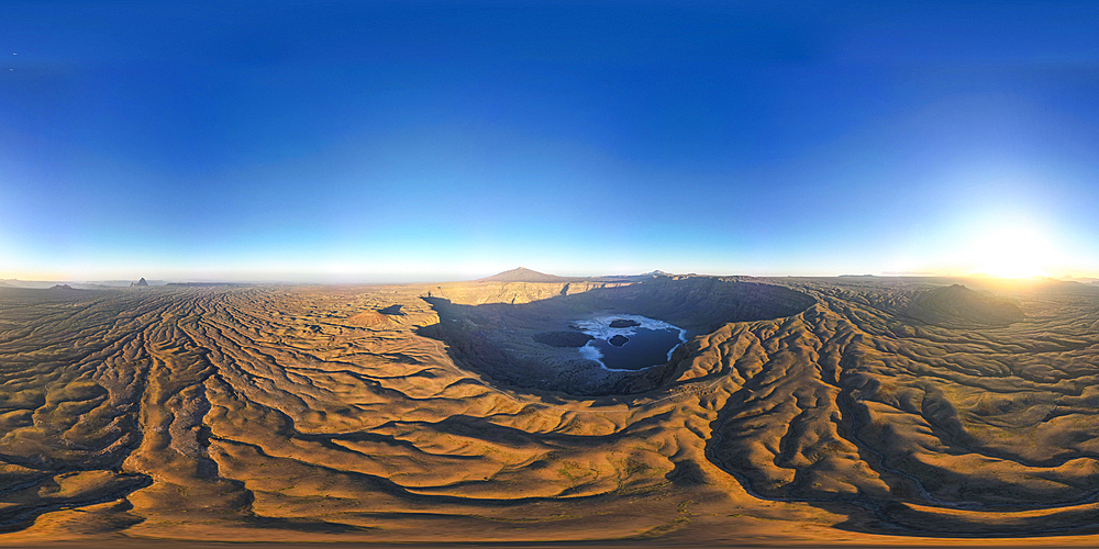 Aerial over Trou du Natron with volcano Tousside in the background, Tibesti Mountains, Chad, Africa