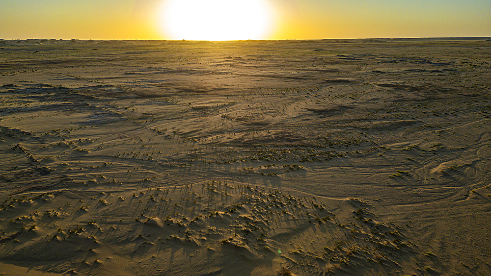 Aerial of sunset over a beautiful sand dune in the Tibesti Mountains, Chad, Africa