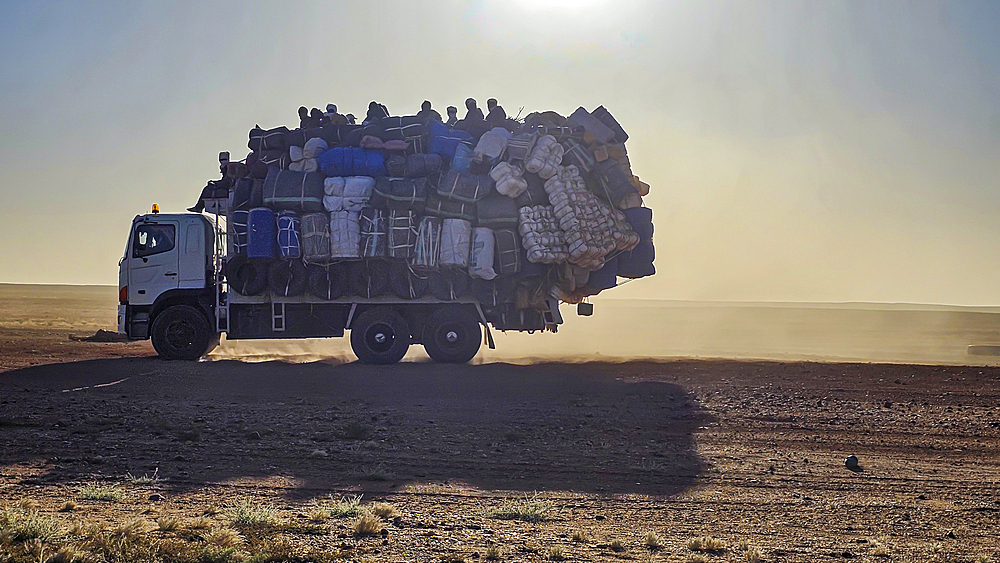 Full packed truck in the Sahel zone on his way to the Tibesti Mountains, Chad, Africa