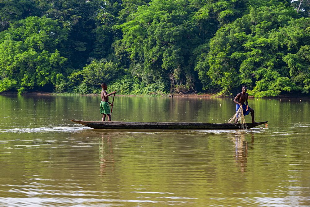 Locals in a canoe, Sangha River, Unesco site Dzanga Sangha National Park, Central African Republic