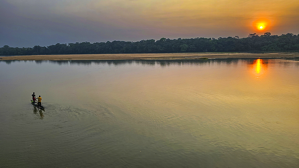 Locals in a canoe, Sangha River, Unesco site Dzanga Sangha National Park, Central African Republic