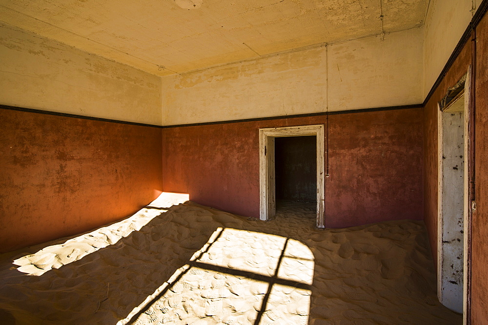 Sand in an old colonial house, old diamond ghost town, Kolmanskop (Coleman's Hill), near Luderitz, Namibia, Africa