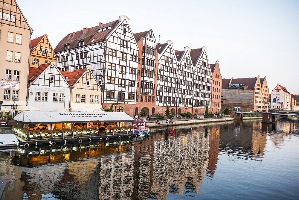 Hanseatic League houses on the Motlawa River at sunset, Gdansk, Poland, Europe