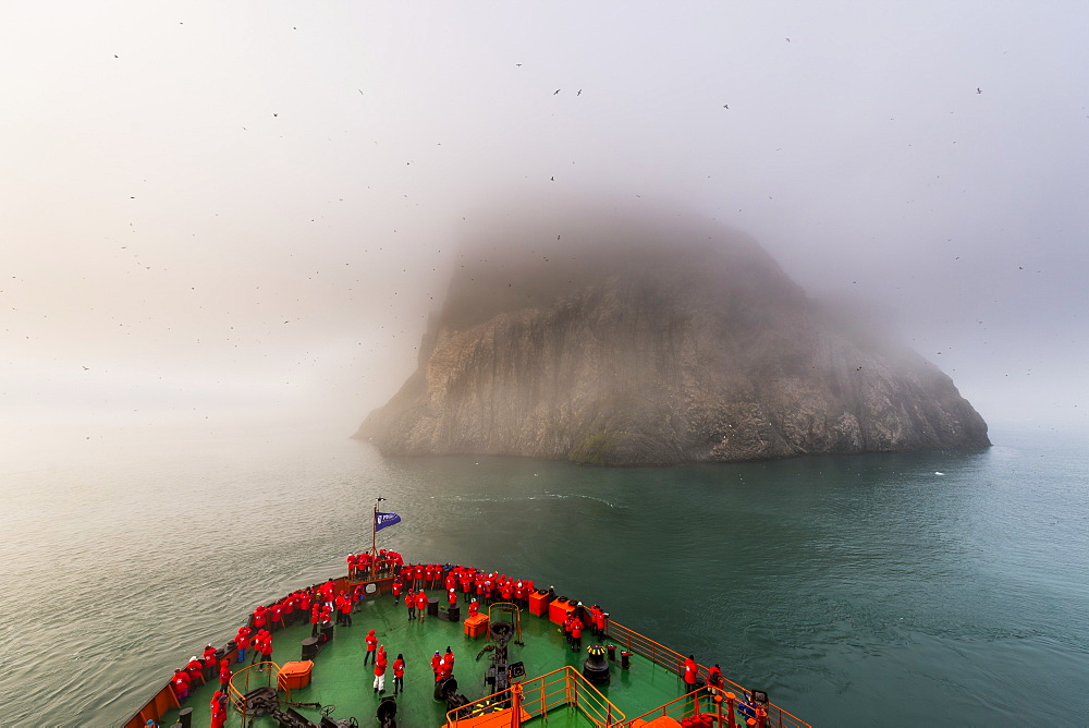 Icebreaker approaching the Skala Rubini (Rubini rock), Franz Josef Land archipelago, Arkhangelsk Oblast, Arctic, Russia, Europe