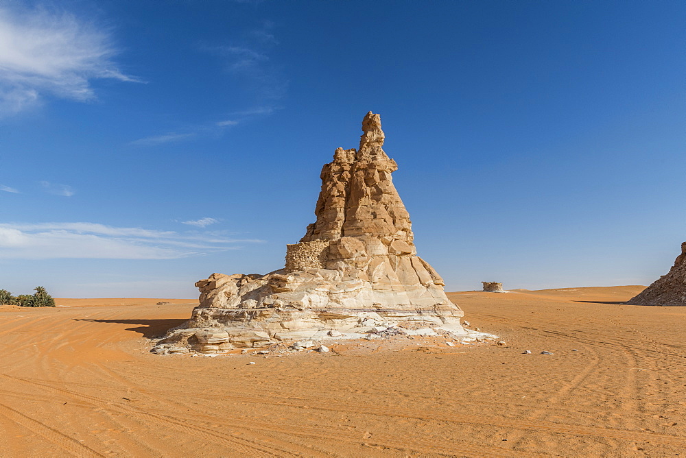 Sandstone tower at a Salt water lake in Northern Chad, Africa