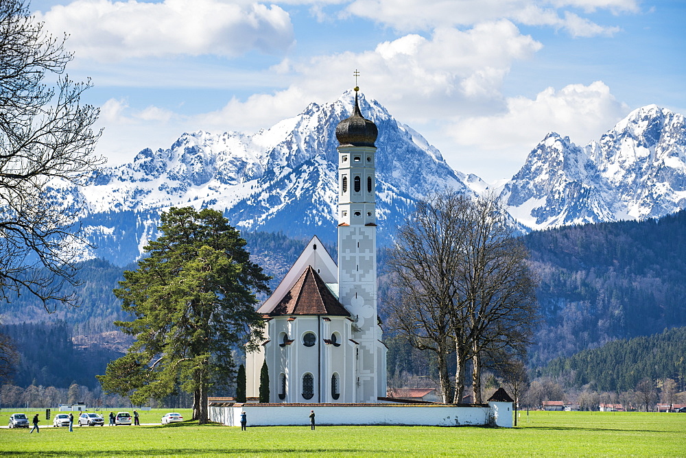 Catholic Church of St. Coloman with the Alps behind, Schwangau, Bavaria, Germany, Europe