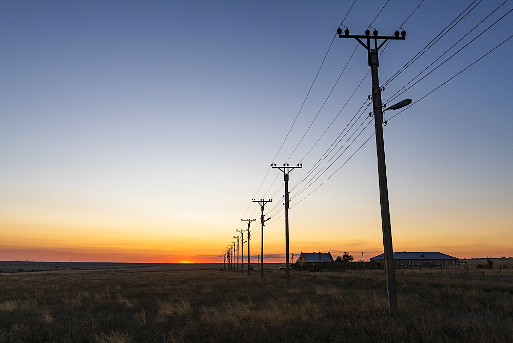 Electric lines at sunset in Elista, Republic of Kalmykia, Russia, Eurasia