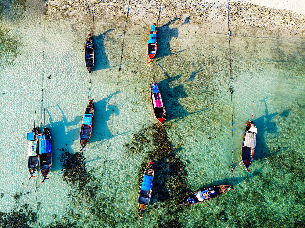 Aerial of fishing boats in the waters of Koh Lipe, Tarutao National Park, Thailand, Southeast Asia, Asia