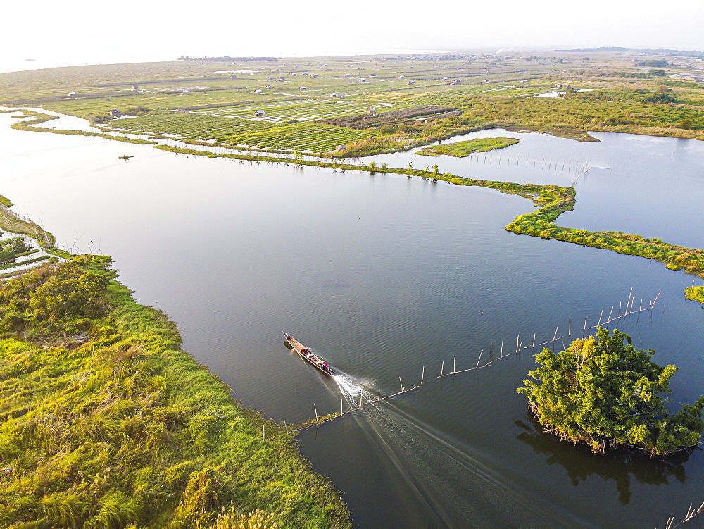 View by drone of little boat on Inle Lake between the floating gardens, Shan state, Myanmar (Burma), Asia