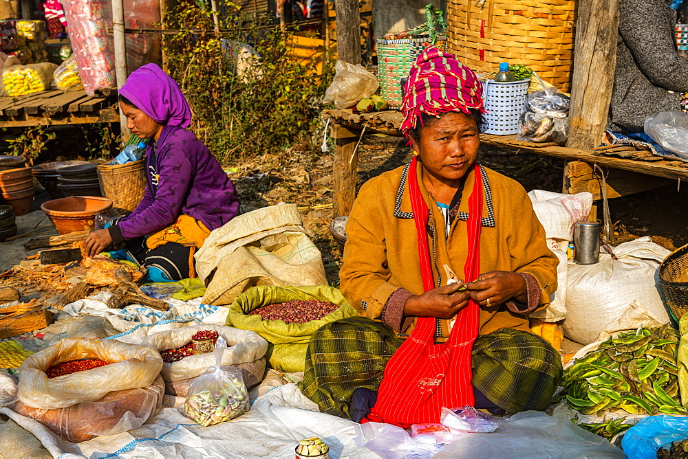 Tribal women selling vegetables at the Market of Inn Thein, Inle Lake, Shan state, Myanmar (Burma), Asia