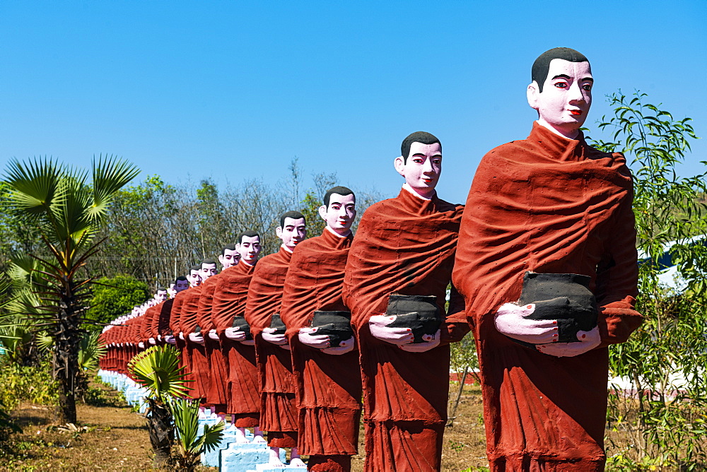 Huge line of pilgrim statues in Win Sein Taw Ya outside Mawlamyine, Mon state, Myanmar (Burma), Asia