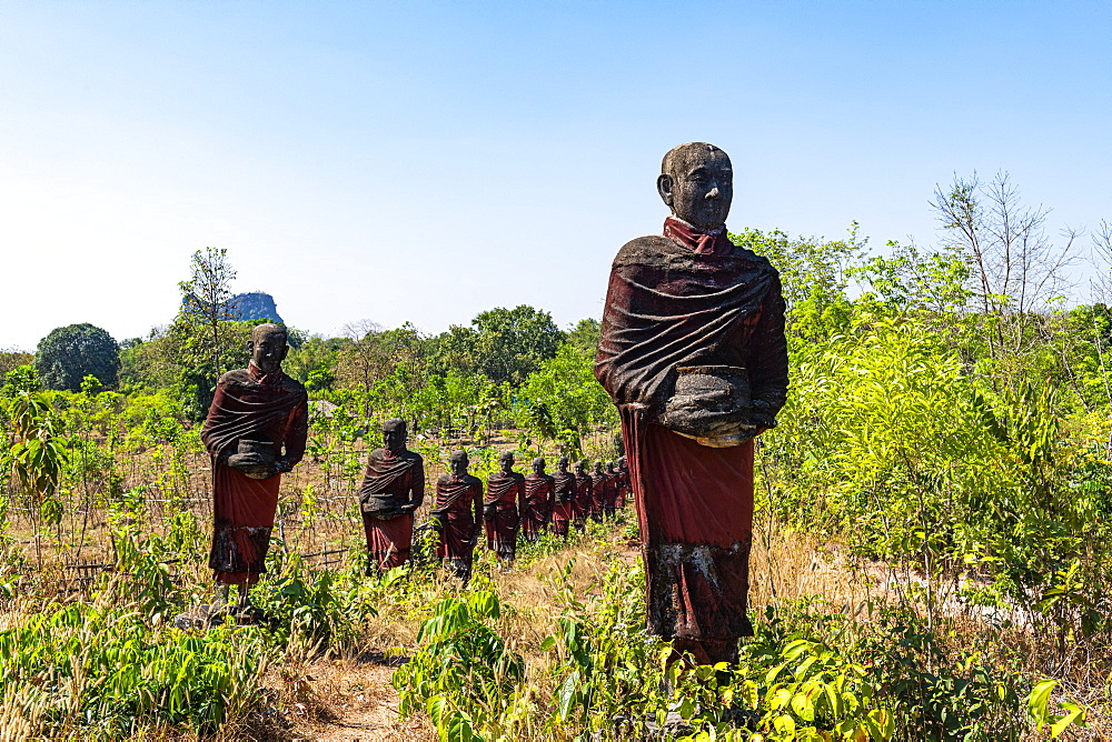 Huge line of pilgrim statues in Win Sein Taw Ya outside Mawlamyine, Mon state, Myanmar (Burma), Asia