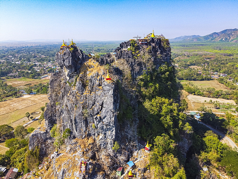 Aerial by drone of Kyauktalon Taung crag with a Hindu temple, near Mawlamyine, Mon state, Myanmar (Burma), Asia