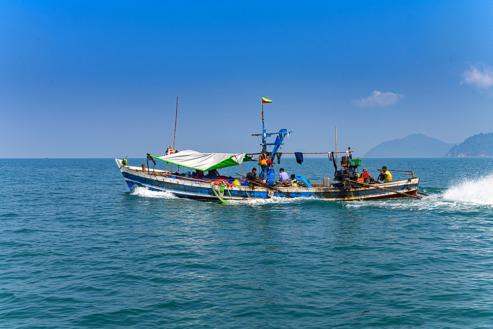 Sea gypsies Moken on their fishing boat, Mergui (Myeik) Archipelago, Myanmar (Burma), Asia