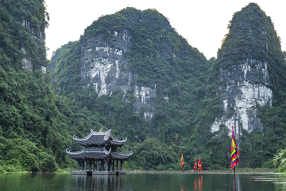 Temple standing between the scenic limestone mountains of Trang An Landscape Complex, UNESCO World Heritage Site, Vietnam, Indochina, Southeast Asia, Asia