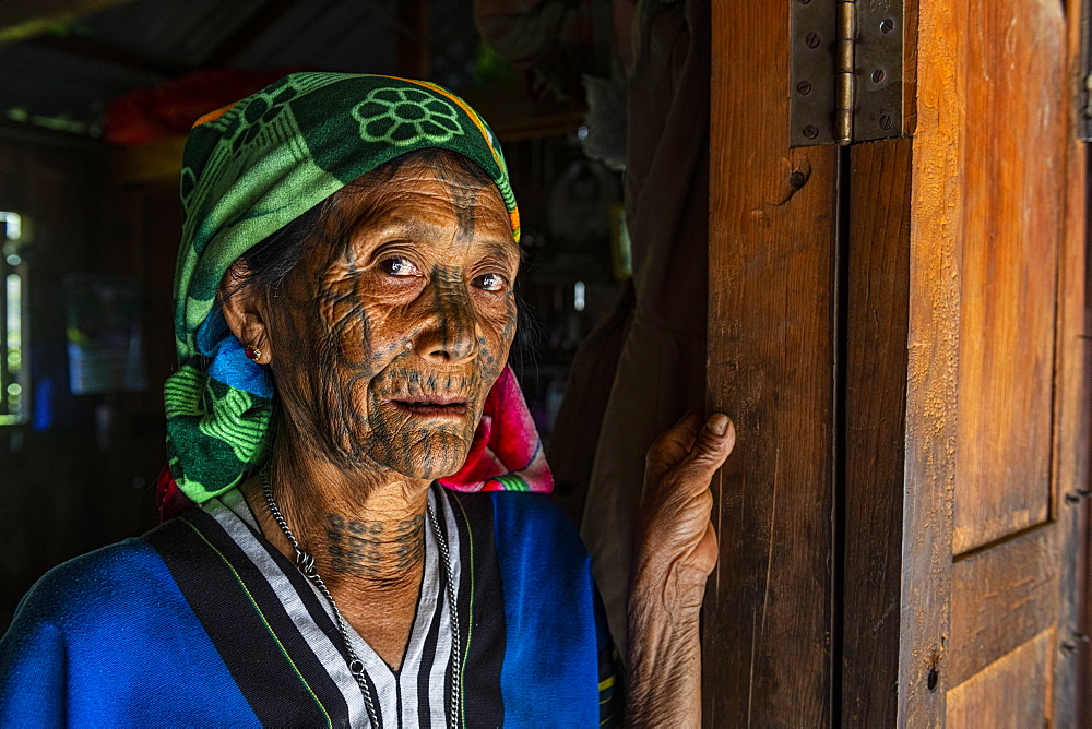 Chin woman with spiderweb tattoo, Mindat, Chin state, Myanmar (Burma), Asia