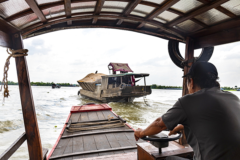 Ferry boat at a water channel, Cai Be, Mekong Delta, Vietnam, Indochina, Southeast Asia, Asia