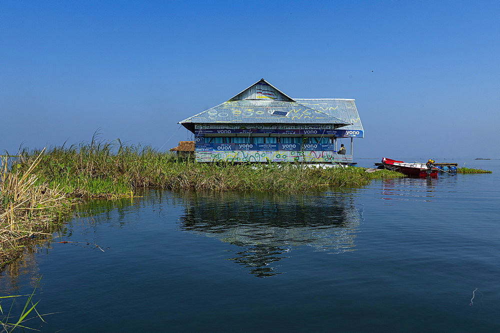 Fisher house on a phumdi (floating island), Loktak Lake, Moirang, Manipur, India, Asia