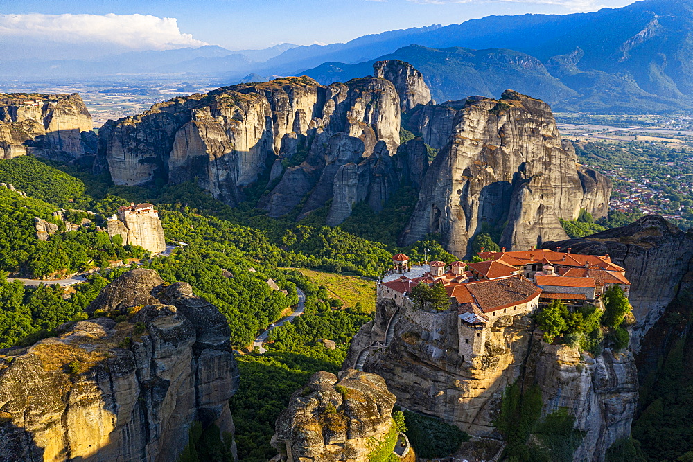 Aerial by drone of the Holy Monastery of Varlaam at sunrise, UNESCO World Heritage Site, Meteora Monasteries, Greece, Europe