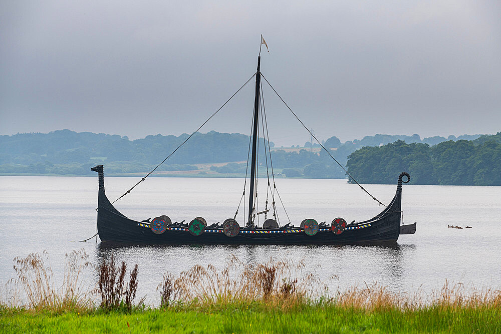 Viking boat on a lake,  Jelling Stones, UNESCO World Heritage Site, Jelling, Denmark, Scandinavia, Europe