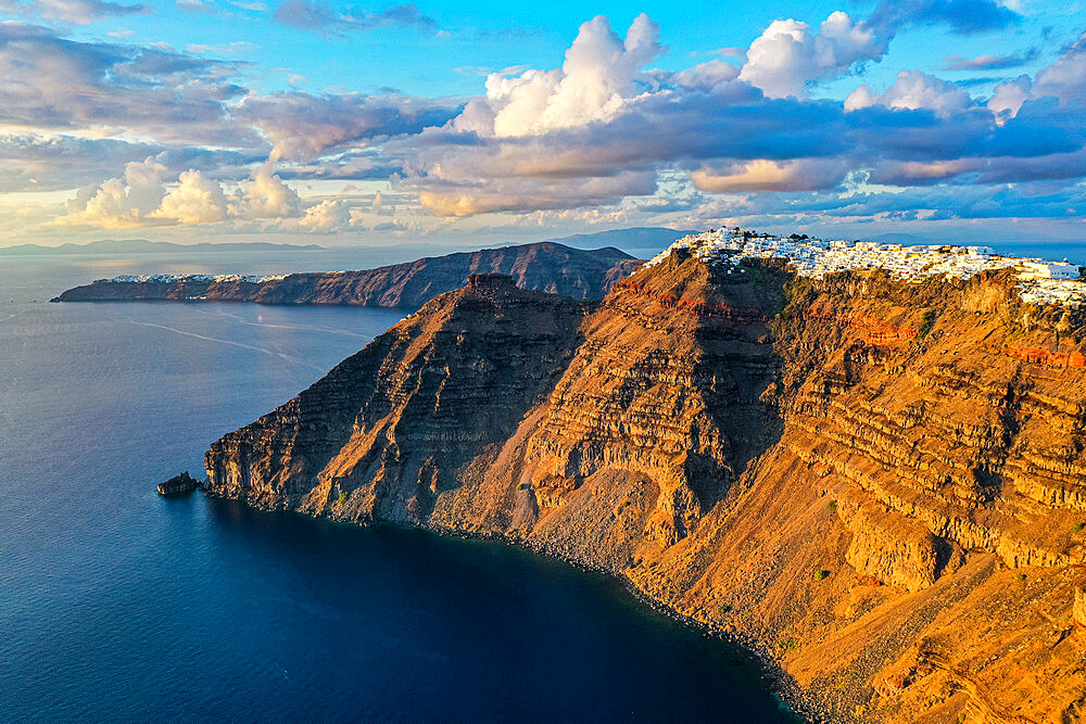 Aerial of Fira at sunset, Santorini, Cyclades, Greek Islands, Greece, Europe