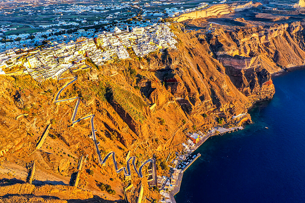 Aerial of Fira at sunset, Santorini, Cyclades, Greek Islands, Greece, Europe