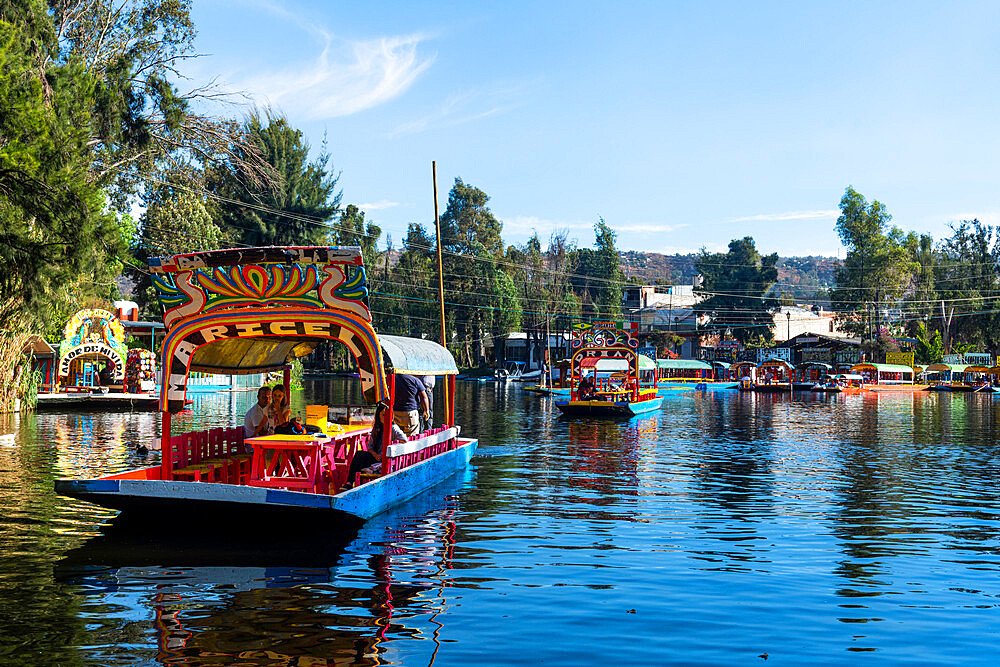 Colourful boats on the Aztec canal system, UNESCO World Heritage Site, Xochimilco, Mexico City, Mexico, North America