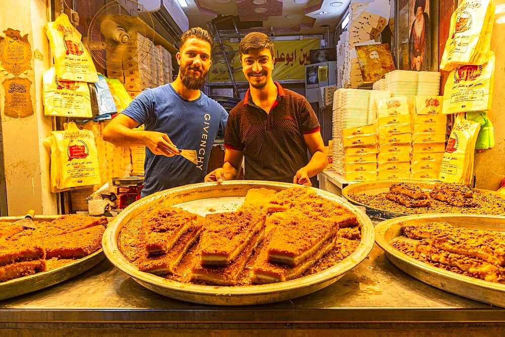 Locals selling sweets, Imam Ali Holy Shrine, Najaf, Iraq, Middle East