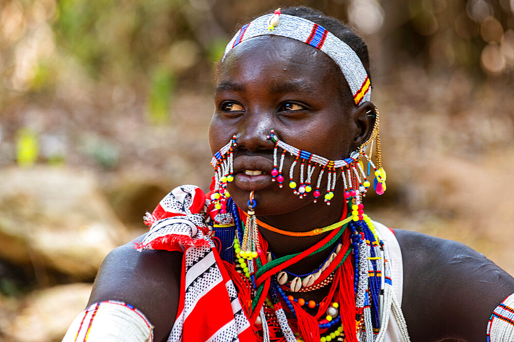 Traditional dressed young girl from the Laarim tribe, Boya Hills, Eastern Equatoria, South Sudan, Africa