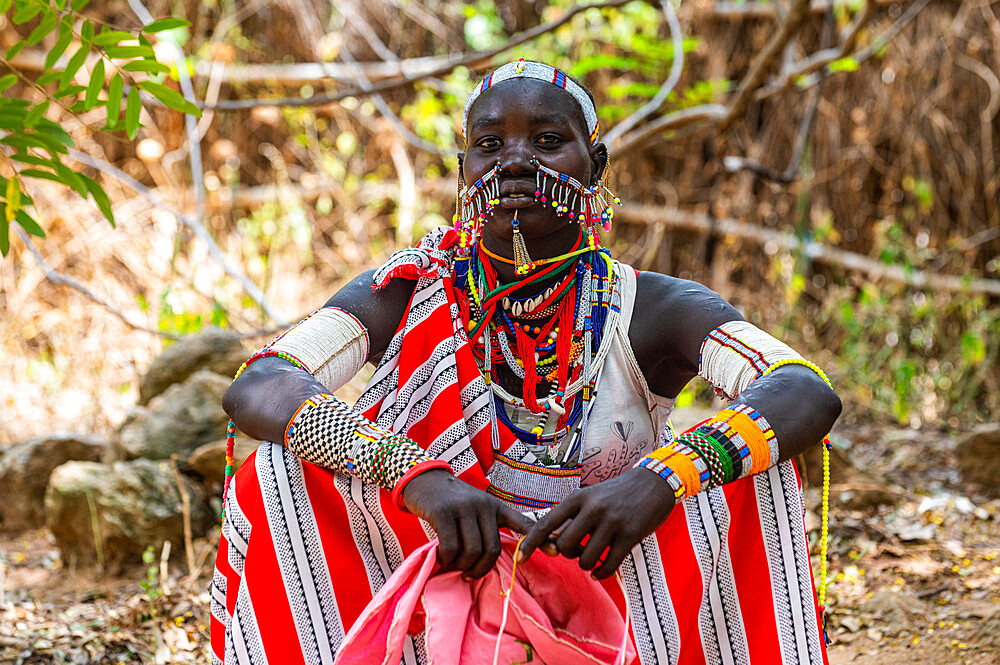 Traditional dressed young girl from the Laarim tribe, Boya Hills, Eastern Equatoria, South Sudan, Africa