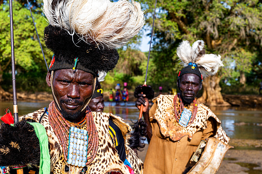 Men from the Toposa tribe posing in their traditional warrior costumes, Eastern Equatoria, South Sudan, Africa